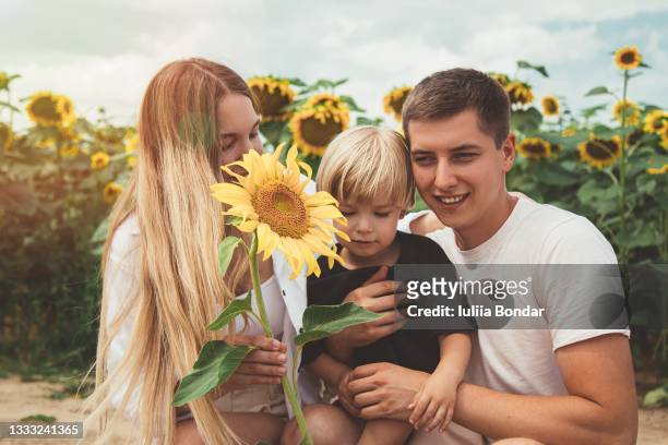 happy family moments. - happy sunflower stock pictures, royalty-free photos & images