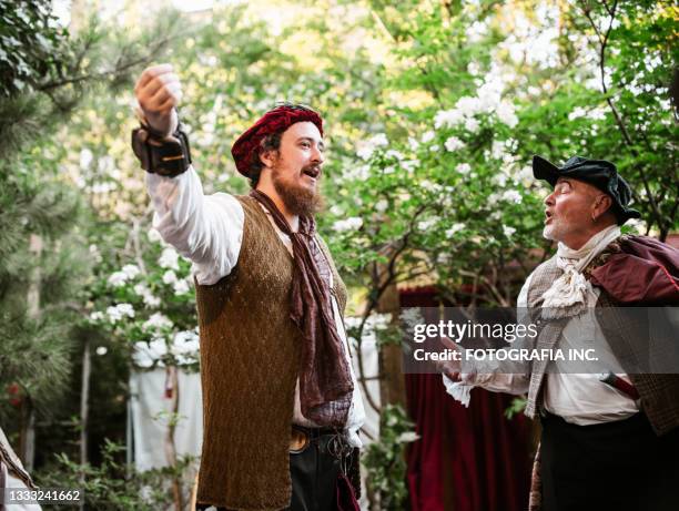 actors during the play in outdoor theatre - theater performance outdoors stock pictures, royalty-free photos & images