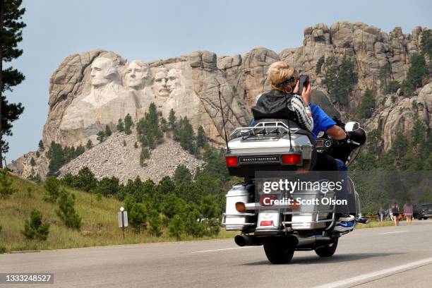 Motorcyclist rides along the road to Mt. Rushmore on August 09, 2021 near Keystone, South Dakota. Every August hundreds of thousands of motorcycling...