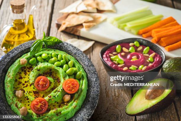 avocado and edamame hummus recipe with olive oil and ingredients - edamame stock pictures, royalty-free photos & images