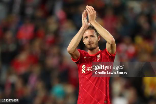 Ben Davies of Liverpool applauds the fans following victory in the Pre-Season Friendly match between Liverpool and Osasuna at Anfield on August 09,...