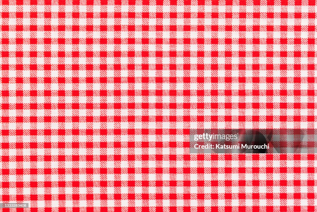 Plaid pattern red colored fabric background