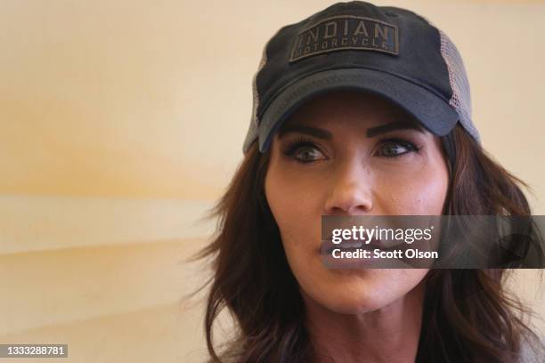 Governor of South Dakota speaks to reporters at the Sturgis Buffalo Chip campground after riding in the Legends Ride for charity on August 09, 2021...