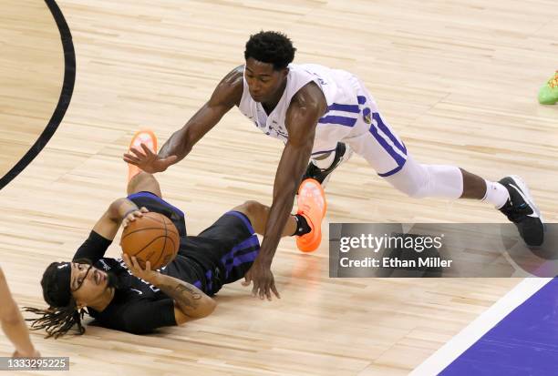 Cole Anthony recovers the ball for a steal against Selom Mawugbe of the Orlando Magic of the Golden State Warriors during the 2021 NBA Summer League...