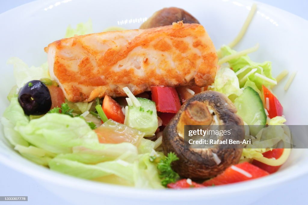 Salmon steak fish fillet served in a bowl
