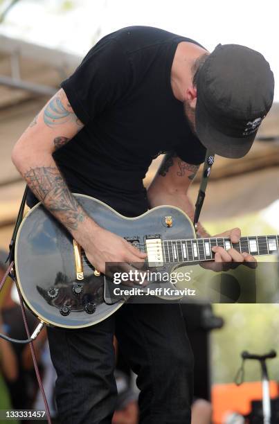 Alex Rosamilia of The Gaslight Anthem perform onstage during Bonnaroo 2010 at Which Stage on June 11, 2010 in Manchester, Tennessee.