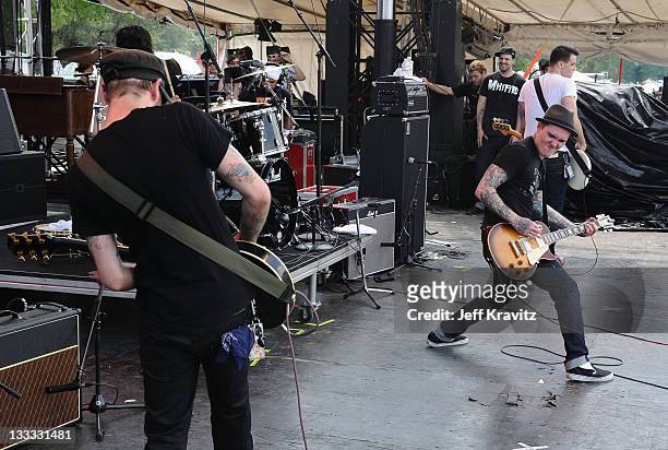 Alex Rosamilia and Brian Fallon of The Gaslight Anthem perform onstage during Bonnaroo 2010 at Which Stage on June 11, 2010 in Manchester, Tennessee.
