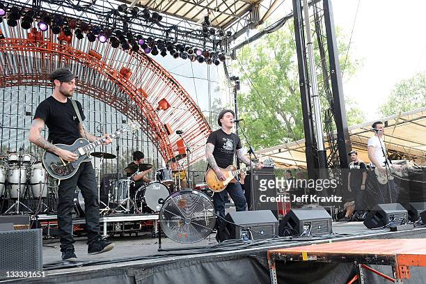 Brian Fallon, Alex Rosamilia and Alex Levine of The Gaslight Anthem perform onstage during Bonnaroo 2010 at Which Stage on June 11, 2010 in...