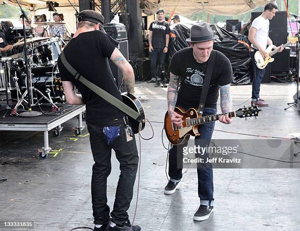 Alex Rosamilia and Brian Fallon of The Gaslight Anthem perform onstage during Bonnaroo 2010 at Which Stage on June 11, 2010 in Manchester, Tennessee.