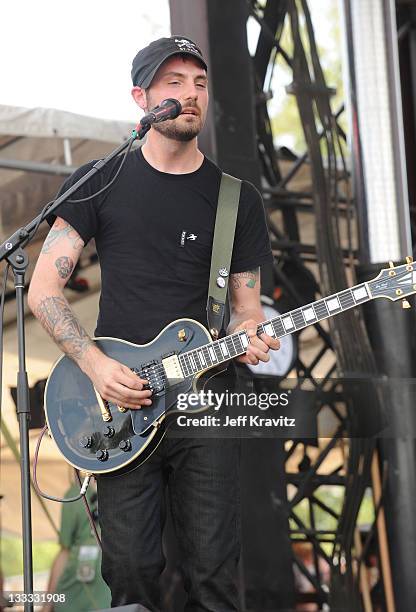 Alex Rosamilia of The Gaslight Anthem perform onstage during Bonnaroo 2010 at Which Stage on June 11, 2010 in Manchester, Tennessee.