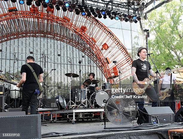 Brian Fallon, Alex Rosamilia and Alex Levine of The Gaslight Anthem perform onstage during Bonnaroo 2010 at Which Stage on June 11, 2010 in...