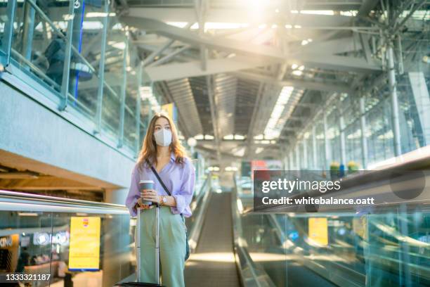 important to travel during the lockdown period to wear a mask and social distancing. - thailand covid stock pictures, royalty-free photos & images