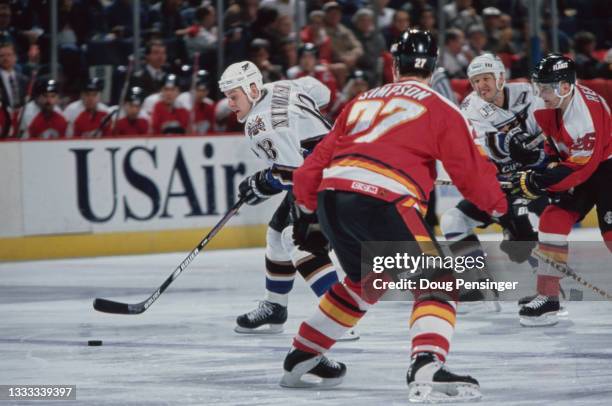 Andrei Nikolishin, Left Wing for the Washington Capitals in motion on the ice during the NHL Eastern Conference Southeast Division game against the...