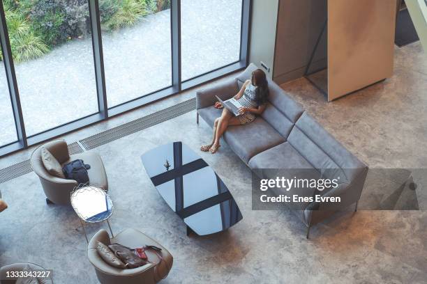 using laptop at office, hotel lobby - front desk laptop stock pictures, royalty-free photos & images