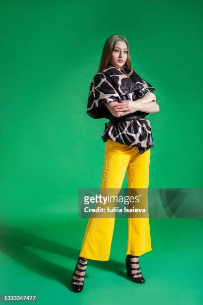 fashionable young woman in stylish colorful outfit - teen boots russian stock pictures, royalty-free photos & images