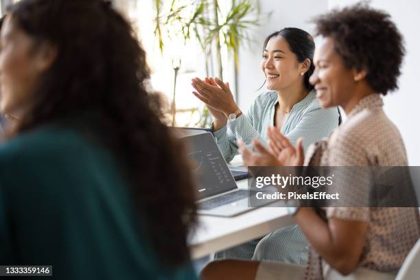 that's what you call a good meeting - applauding staff stock pictures, royalty-free photos & images