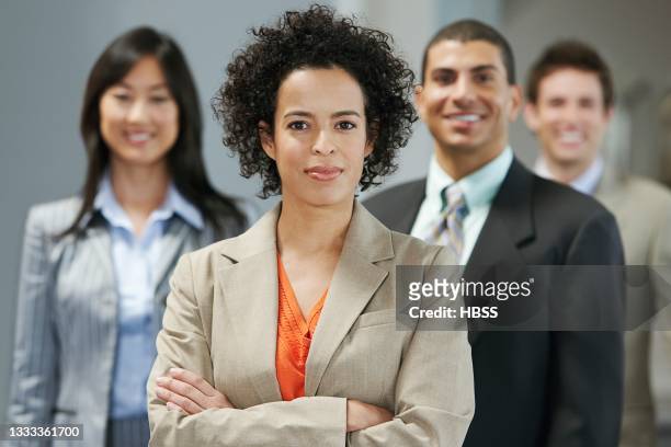 portrait of a confident business team - three people standing stock pictures, royalty-free photos & images