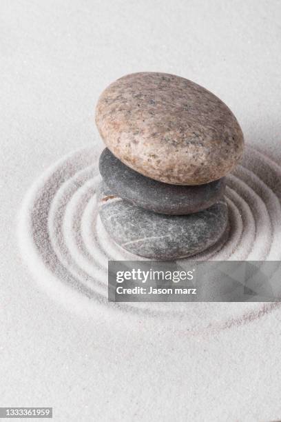 pebbles and sand - balance stone stock pictures, royalty-free photos & images