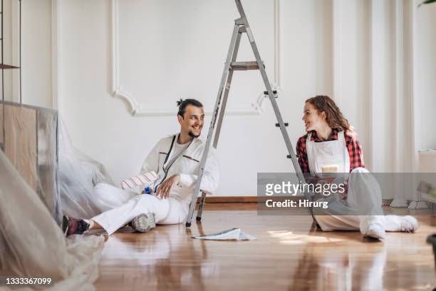 couple renovating their apartment - renovering bildbanksfoton och bilder