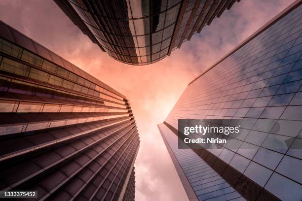 looking up at skyscrapers - national centre stock pictures, royalty-free photos & images