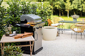 Backyard with barbeque and dining table