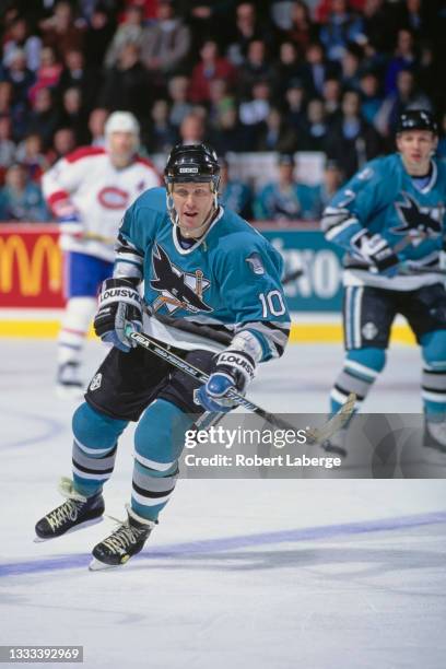 Johan Garpenlov, Left Wing for the San Jose Sharks in motion on the ice during the NHL Eastern Conference Northeast Division game against the...