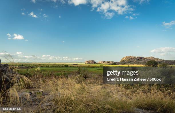 scenic view of field against sky,cannon hill,australia - country town australia stock pictures, royalty-free photos & images