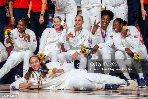 August 8: United States players Chelsea Gray, Sue Bird, Diana Taurasi, Sylvia Fowles, Tina Charles and Brittney Griner celebrate with their gold...