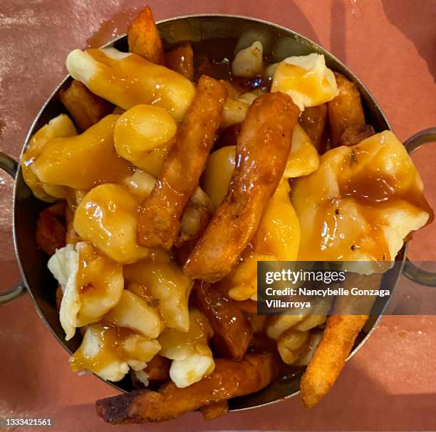 Poutine Patterns 309 Poutine Stock Stock Photos, High-Res Pictures, and Images - Getty ...