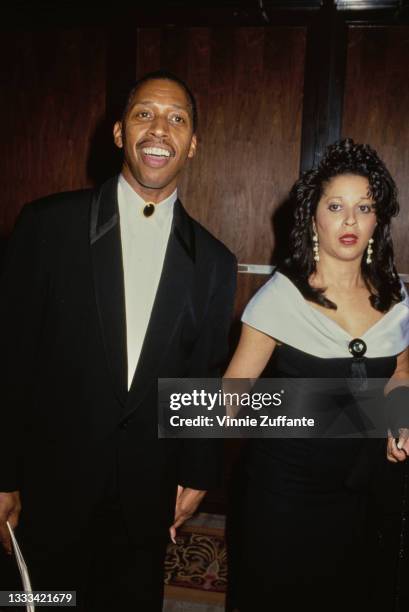 American singer-songwriter Jeffrey Osborne, wearing a black suit with a white shirt, and his wife Sheri, wearing a black off-shoulder dress, at an...