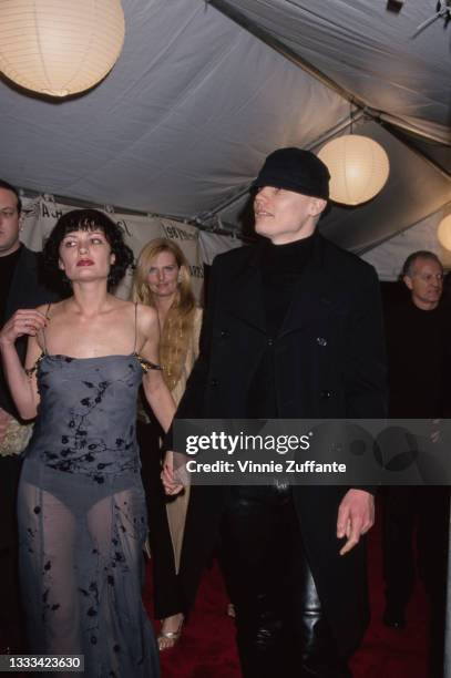 Ukrainian artist and photographer Yelena Yemchuk, wearing a sheer grey dress, and her partner, American singer, songwriter and guitarist Billy...