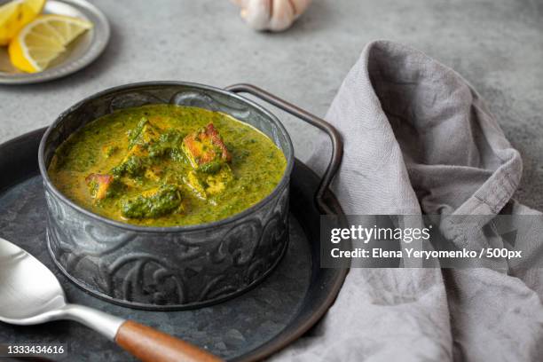 high angle view of food in bowl on table - palak paneer stock pictures, royalty-free photos & images