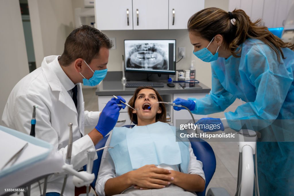 Woman at the dentist getting her teeth sorted