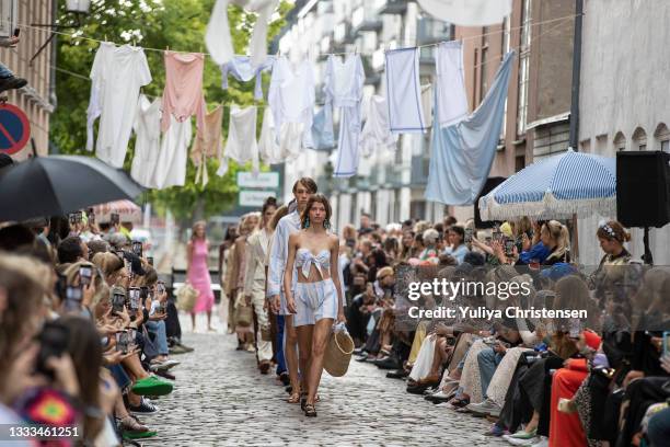 Models walking final walk at the runway during the Lovechild1979 show during the Copenhagen Fashion Week Spring/Summer 2022 on August 10, 2021 in...