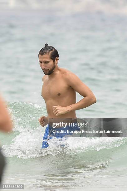 Gianmarco Onestini is seen at the beach on August 10, 2021 in Ibiza, Balearic Islands, Spain.