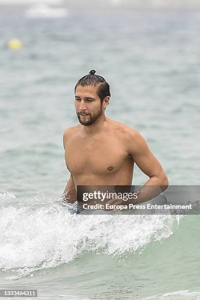 Gianmarco Onestini is seen at the beach on August 10, 2021 in Ibiza, Balearic Islands, Spain.