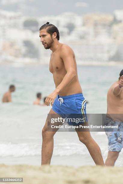 Gianmarco Onestini is seen at the beach on August 10, 2021 in Ibiza, Balearic Islands, Spain.