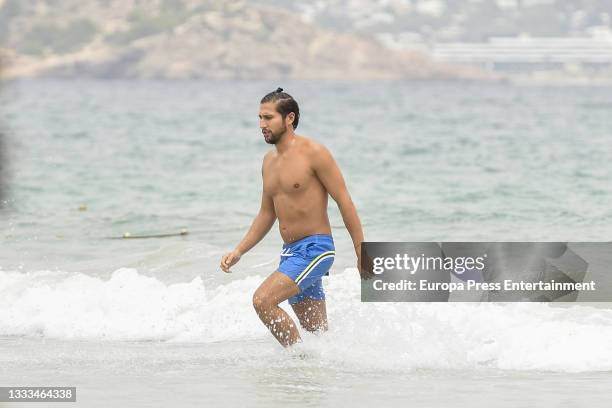 Gianmarco Onestini is seen at the beach on August 10, 2021 in Ibiza, Balearic Islands, Spain.