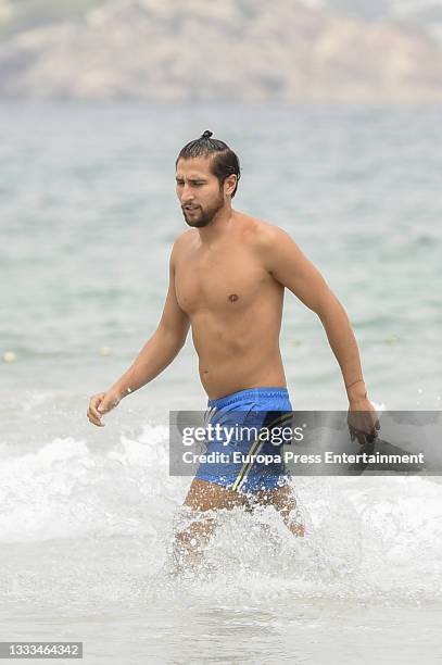 Gianmarco Onestini is seen at the beach on August 10, 2021 in Ibiza, Balearic Islands, Spain.