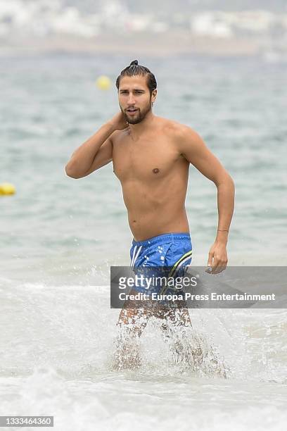 Gianmarco Onestini is seen at the beach on August 10, 2021 in Ibiza, Balearic Islands, Spain.