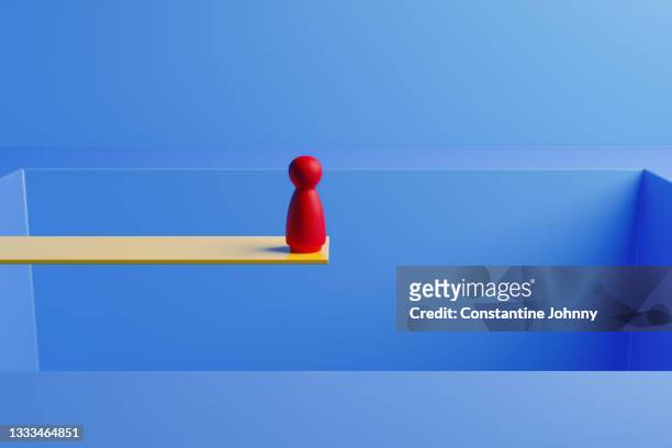 wood people figure at the edge of platform. risk concept with wooden toy. - leap of faith activity stock pictures, royalty-free photos & images