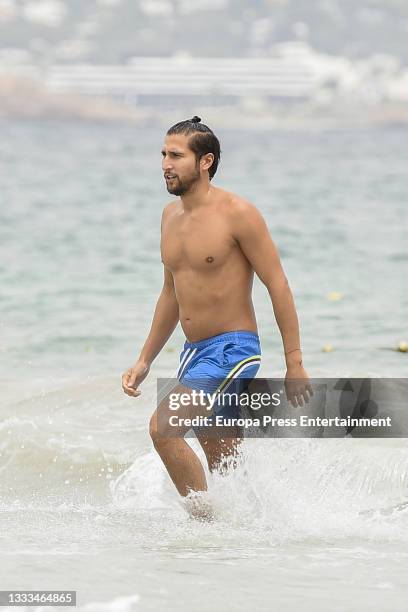 Gianmarco Onestini is seen at the beach on August 10, 2021 in Ibiza, Balearic Islands, Spain.