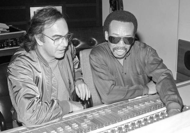 American singer-songwriter and actor Neil Diamond and American singer, musician, songwriter, and record producer Maurice White , of the American band...