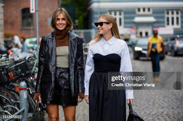 Darja Barannik and Tine Andrea is seen outside 7 Days Active on August 10, 2021 in Copenhagen, Denmark.