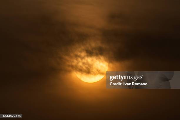 The sun sets on August 10, 2021 in Salerno, Italy. The influence of the African subtropical anticyclone Lucifer continues in Italy, making this week...