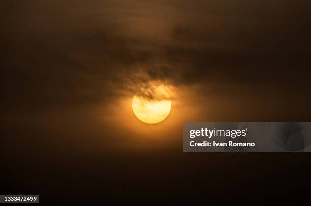 The sun sets on August 10, 2021 in Salerno, Italy. The influence of the African subtropical anticyclone Lucifer continues in Italy, making this week...