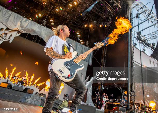 Pete Wentz of Fall Out Boy performs during the Hella Mega Tour at Comerica Park on August 10, 2021 in Detroit, Michigan.