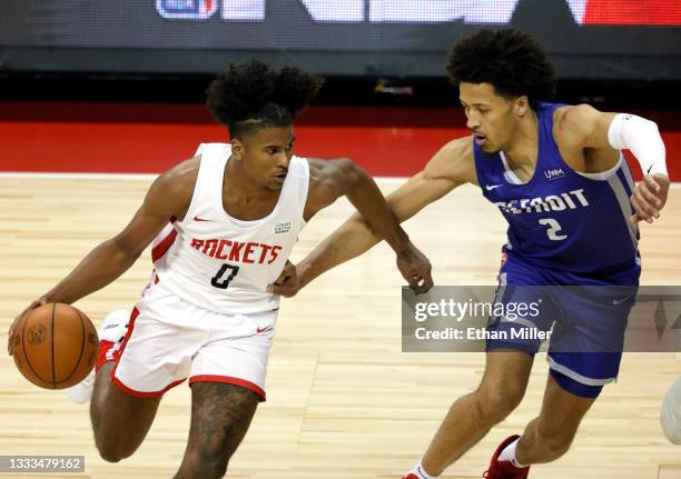 Jalen Green of the Houston Rockets drives against Cade Cunningham of the Detroit Pistons during the 2021 NBA Summer League at the Thomas & Mack...