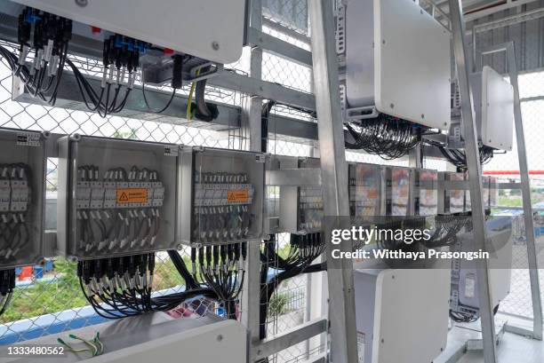 electrical breaker inside electric panel in power plant. - electrical panel box fotografías e imágenes de stock