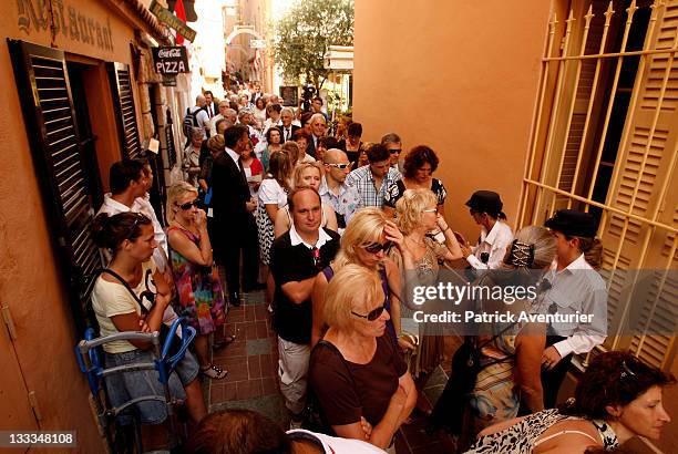 Guests arrive to attend the civil ceremony of the Royal Wedding of Prince Albert II of Monaco to Charlene Wittstock at the Prince's Palace on July 1,...